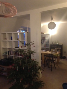 Christmassy living room is Christmassy. Note Ikea units filled with ALL THE THINGS. 